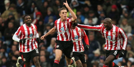 Liverpool en Sunderland rond over Henderson